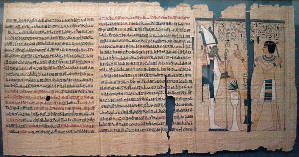 Part of the Book of the Dead of Pinedjem II. The text is hieratic, except for hieroglyphics in the vignette. The use of red pigment, and the joins between papyrus sheets, are also visible. 