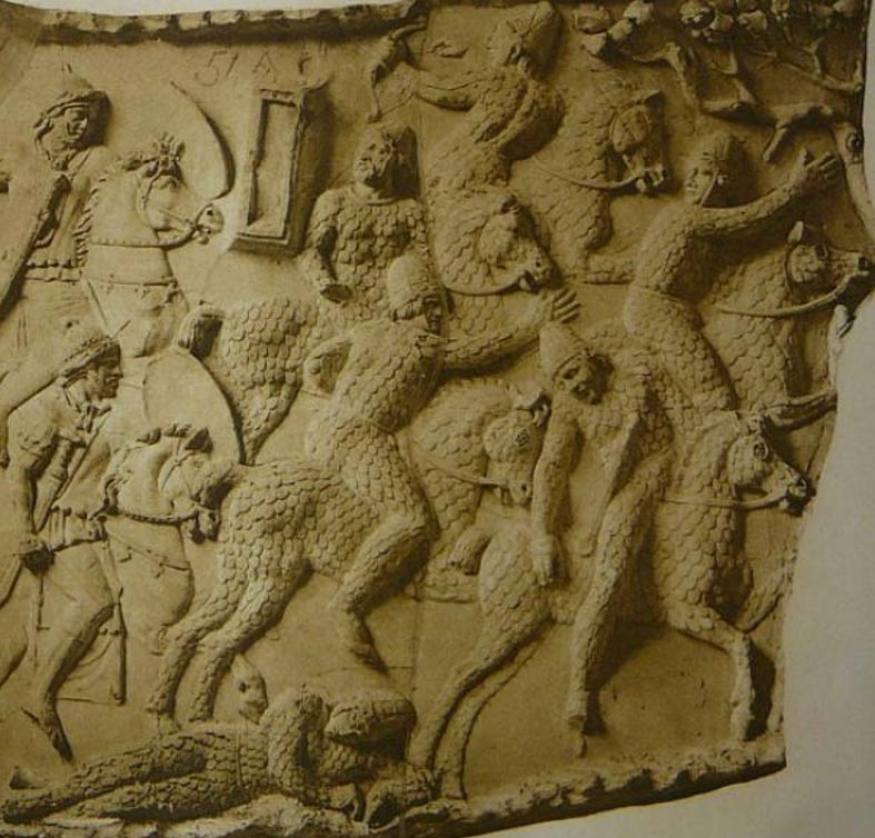 A depiction of Sarmatian cataphracts fleeing from Roman cavalry during the Dacian wars circa 101 AD, at Trajan's Column in Rome (Public Domain). One man has fallen from his horse, the greatest danger for a cataphract.